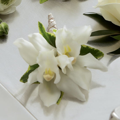 White Mini Cymbidium Boutonniere –  Evans-king Floral, Forty Fort PA